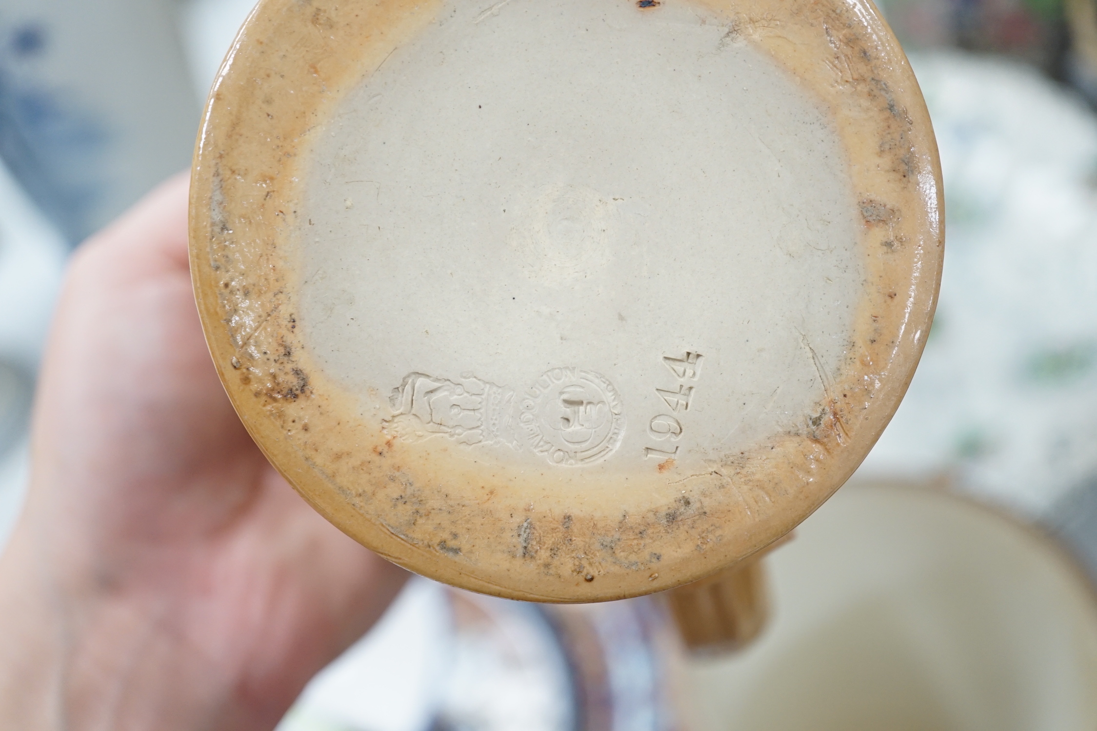 Two Pratt type jugs, an Enoch Wood flower pot, various 19th century pottery jugs, plates etc.